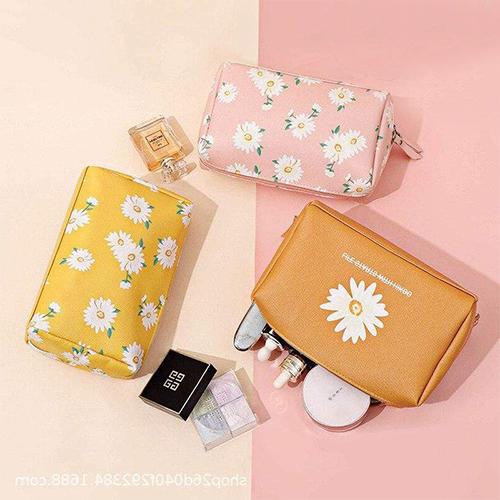 Kosmetiktasche mit Blumenmuster